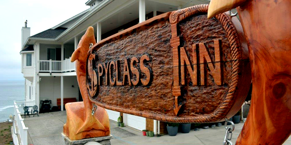 The new Spyglass Inn sign was a culmination of two of the best talents in the cove. K & M Masonry and Bruce Willis, woodcarver, produced this eclectic masterpiece that greets our guests upon arrival.