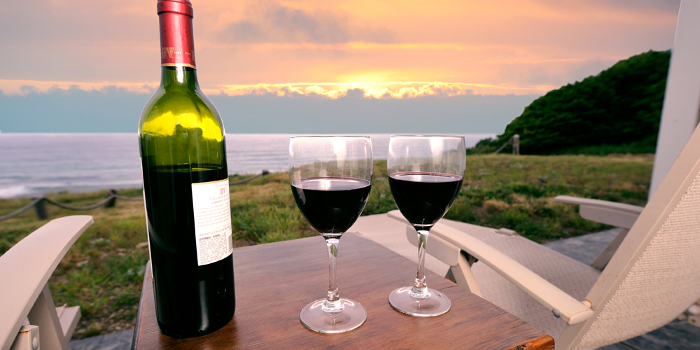 sunset and a bottle of wine at the Spyglass Inn at Shelter Cove in Shelter Cove, CA